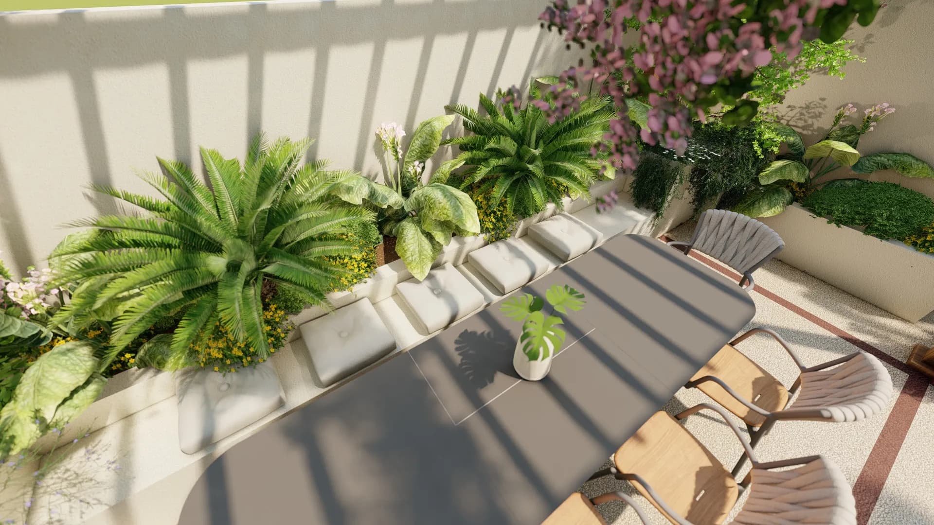 Cycas revoluta, canna indica ed altre erbacee sono inerite in questa fioriera in muratura dotata anche di seduta con cuscini