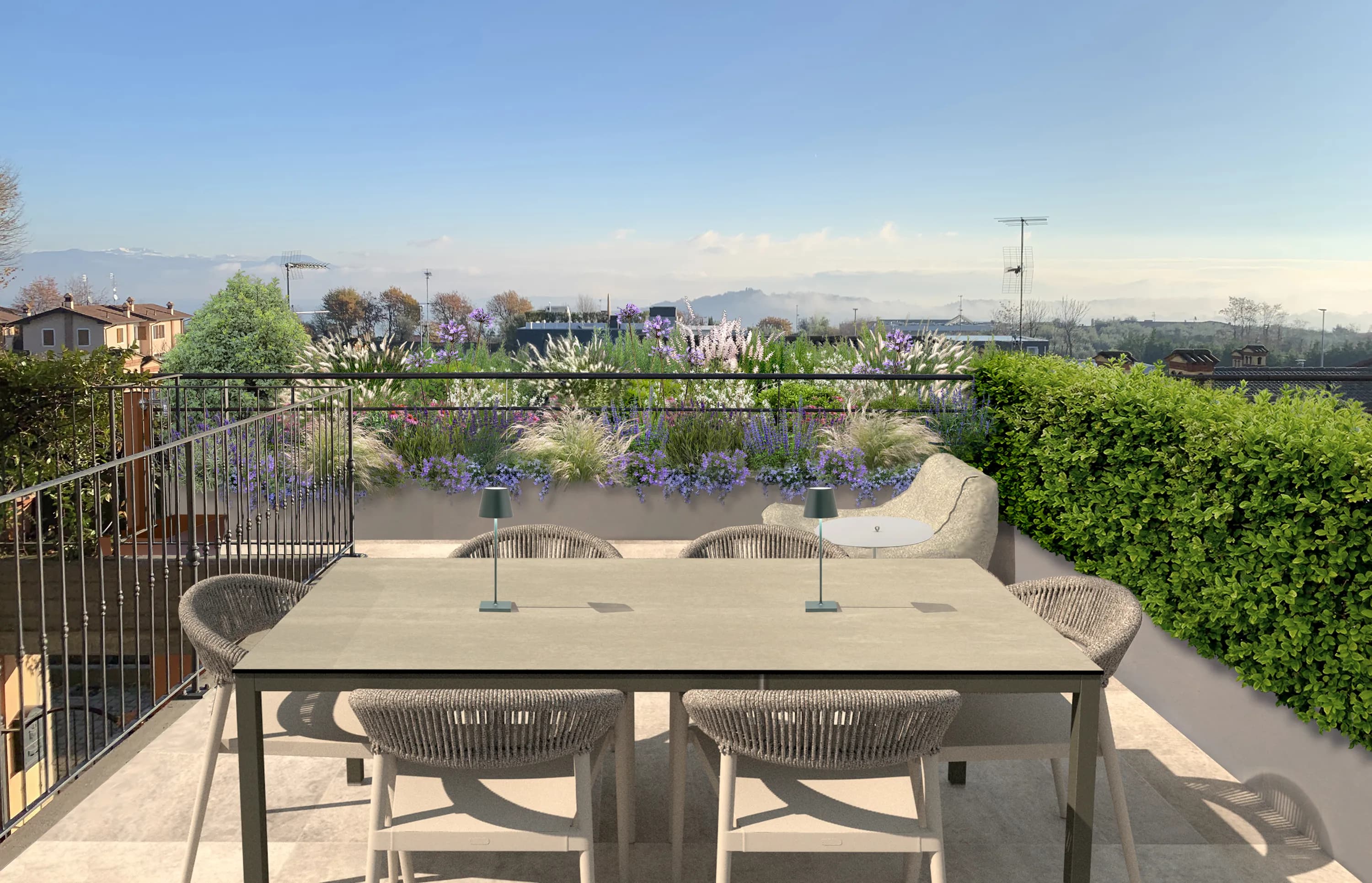progettazione terrazzo con fioriere in metallo, tavolo da pranzo